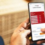 Betting Strategies Applied To Mobile Lottery.